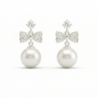 Silver Tone Bow Pearl Drop Earrings