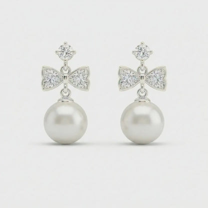 Silver Tone Bow Pearl Drop Earrings