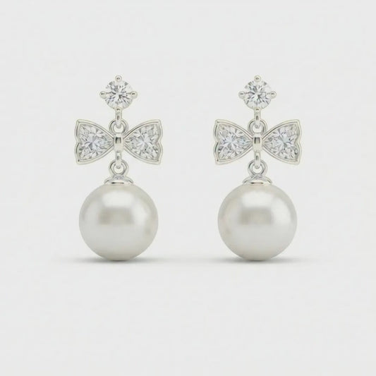 Silver Tone Bow Pearl Drop Earrings